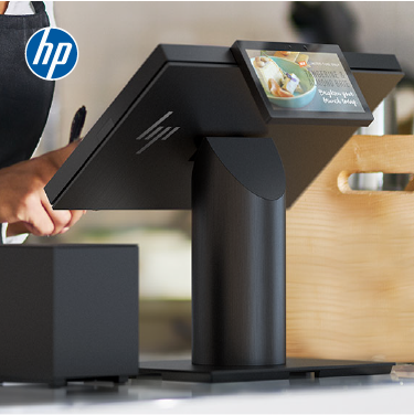 Black HP kiosk with a person interacting with it, blurred background