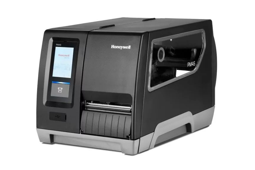 Honeywell PM45 Industrial Label Printer with a color display and multiple connectivity ports, capable of thermal and thermal transfer printing methods.